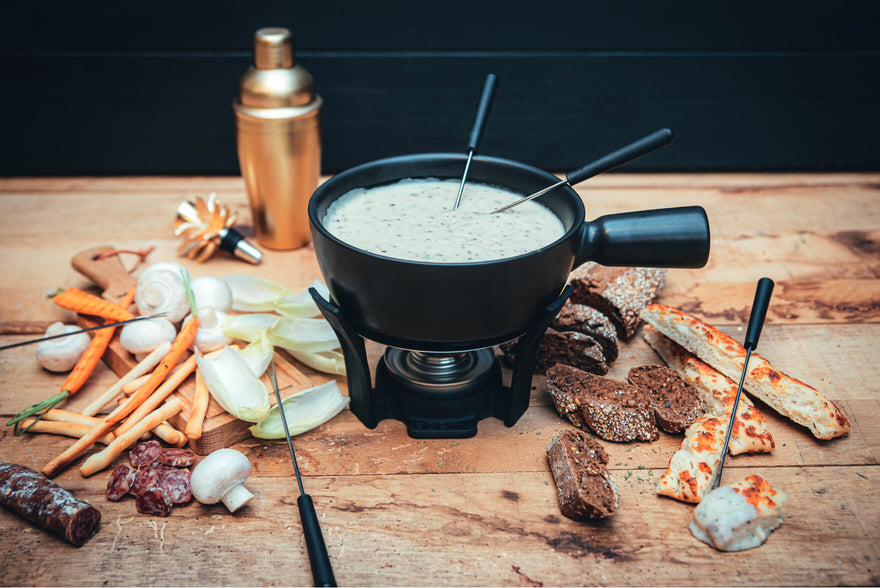 Goat cheese fondue with truffle tapenade
